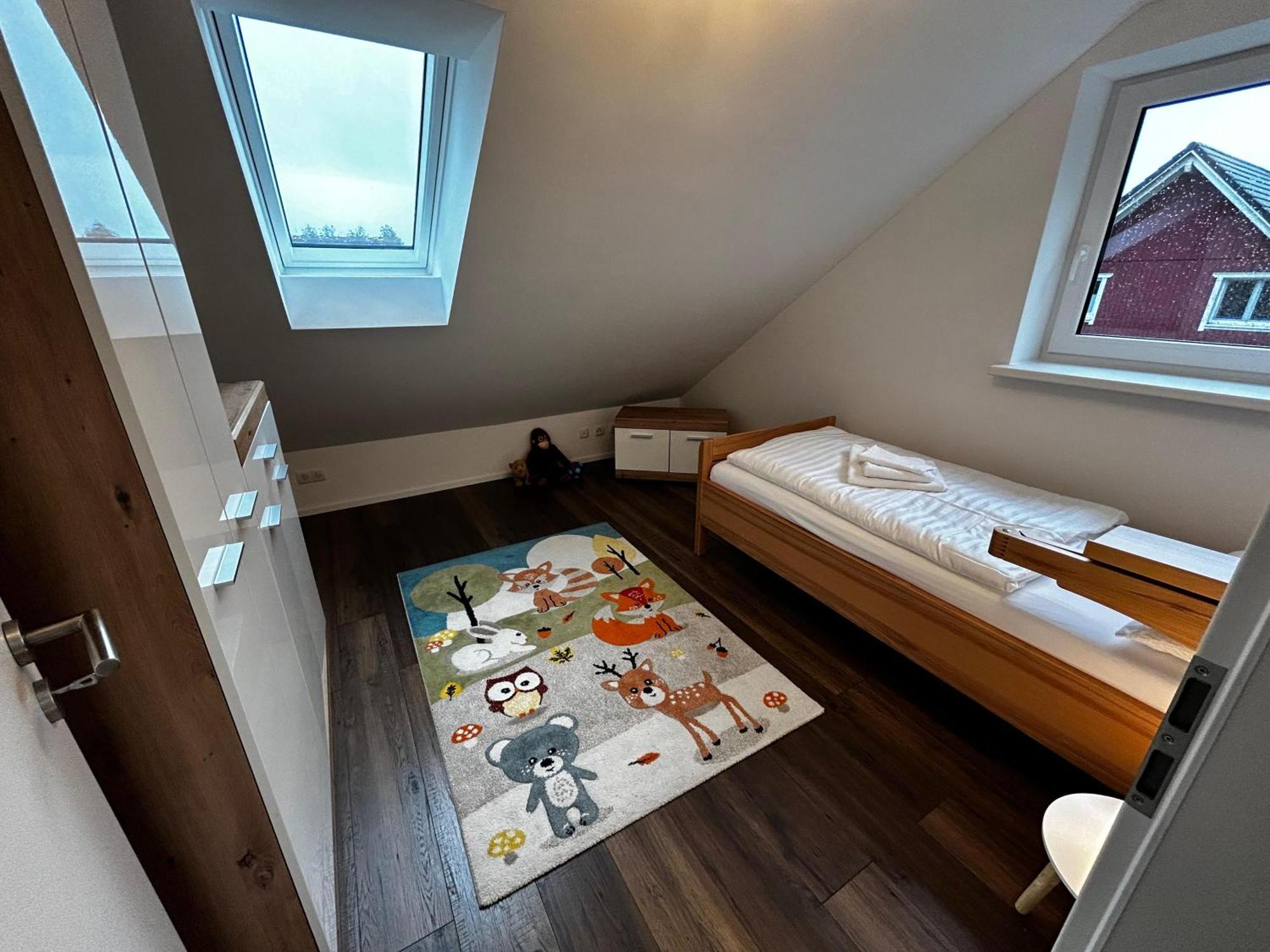 Moderne Ferienwohnung Fuer Familien Im Dachgeschoss Bosau Εξωτερικό φωτογραφία
